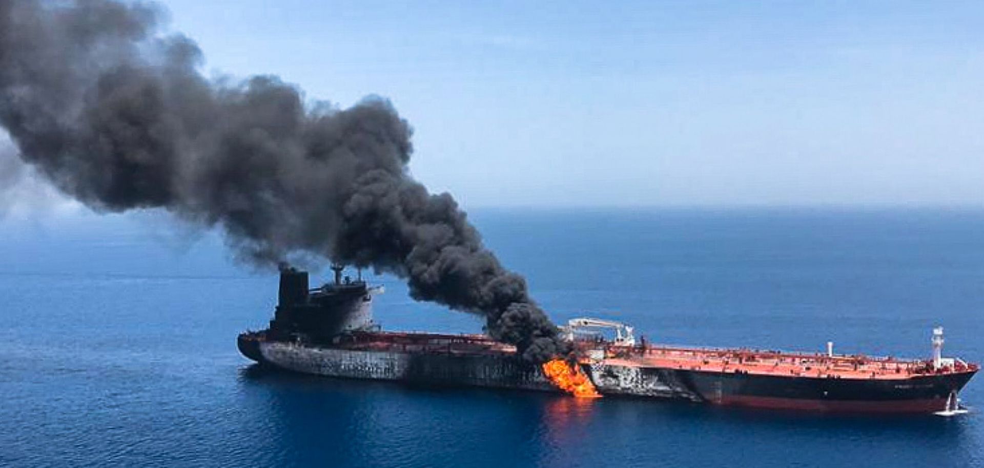 A picture from June 13 shows fire and smoke billowing from the Norwegian-owned Front Altair tanker, said to have been attacked in the waters of the Gulf of Oman.