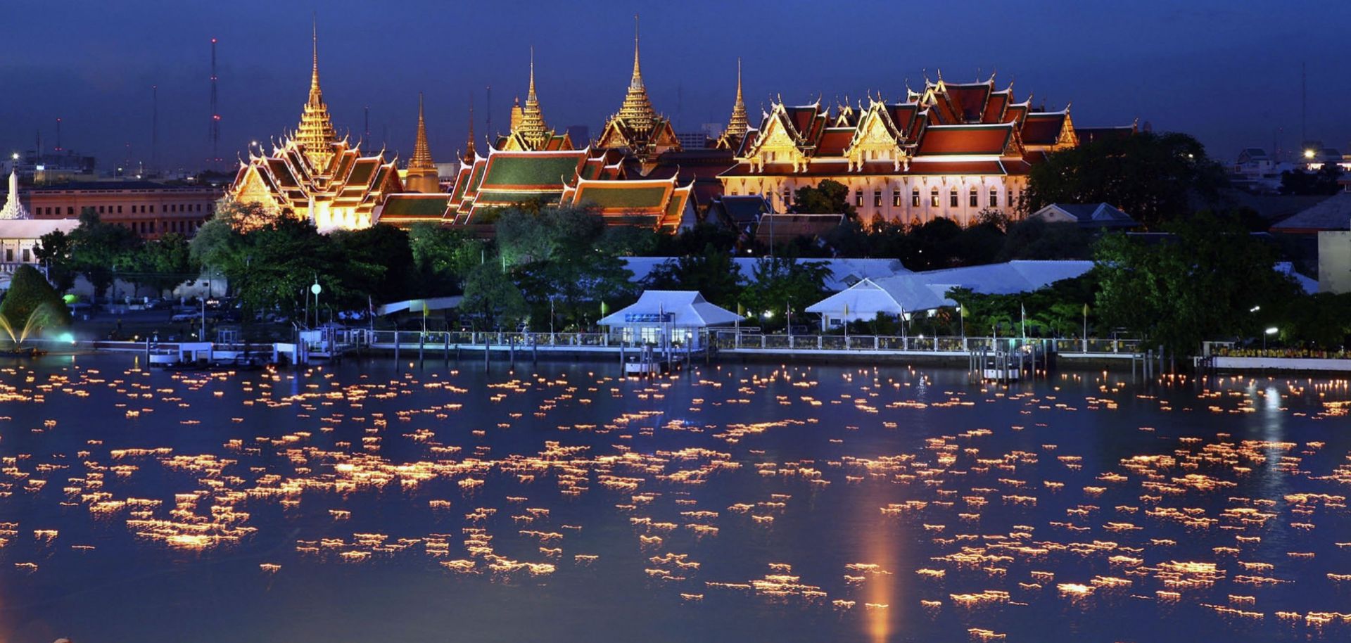 The Chaophaya river is lit by candles during a ceremony celebrating the Thailand's King Bhumibol Adulyadej.