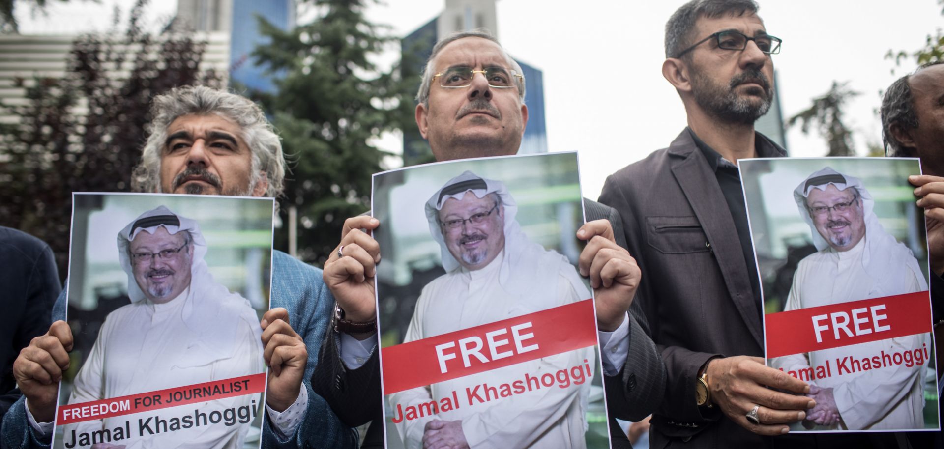 People hold posters of Saudi journalist Jamal Khashoggi during a protest organized by members of the Turkish-Arabic Media Association at the entrance to Saudi Arabia's consulate on Oct. 8 in Istanbul.