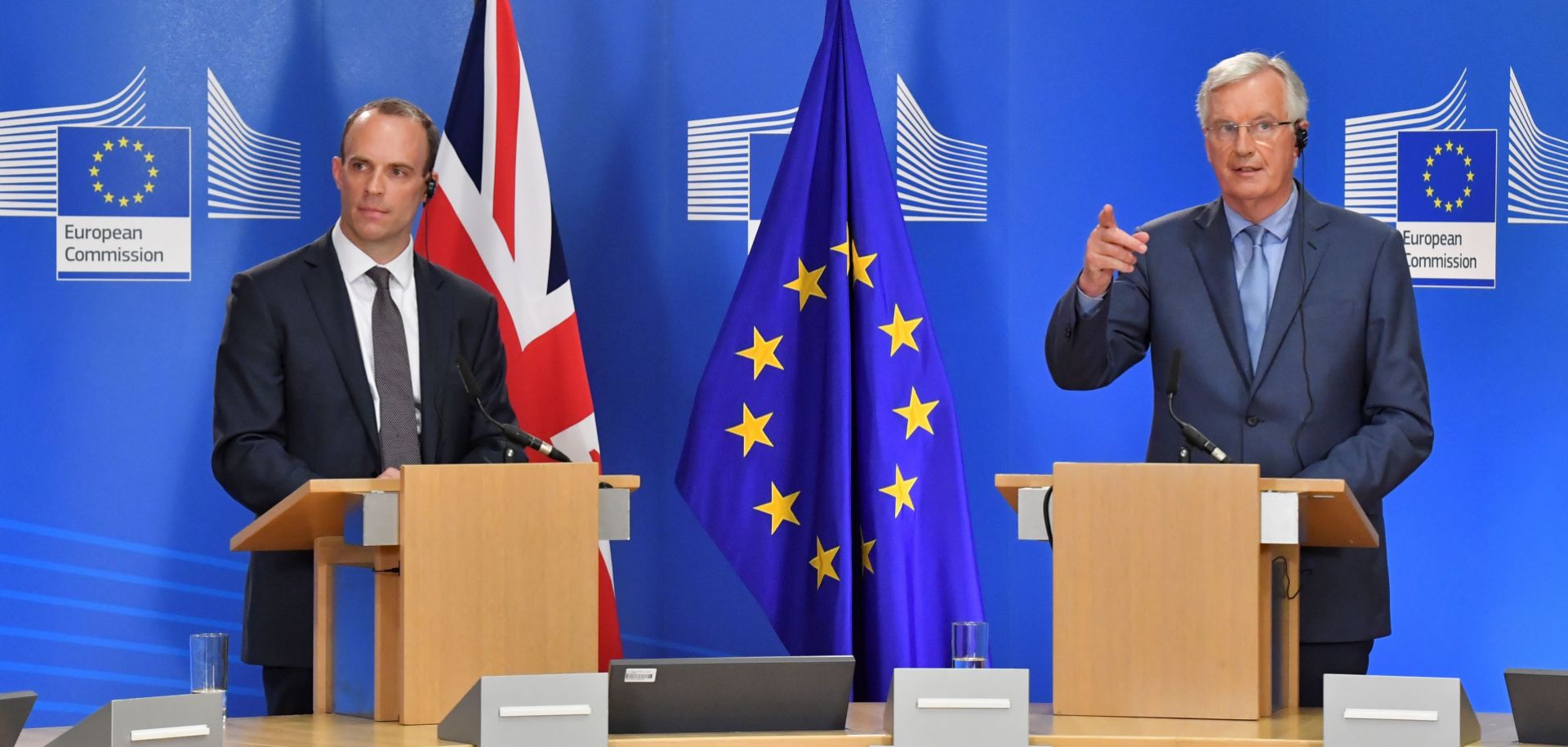 EU Chief Brexit Negotiator Michel Barnier (R) and Britain's Brexit Minister Dominic Raab hold a joint press conference after their meeting at the European Commission in Brussels on July 26, 2018.