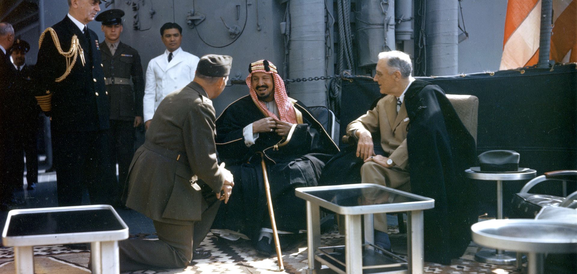 King Abdul Aziz Ibn Saud of Saudi Arabia speaks to US President Franklin D Roosevelt.