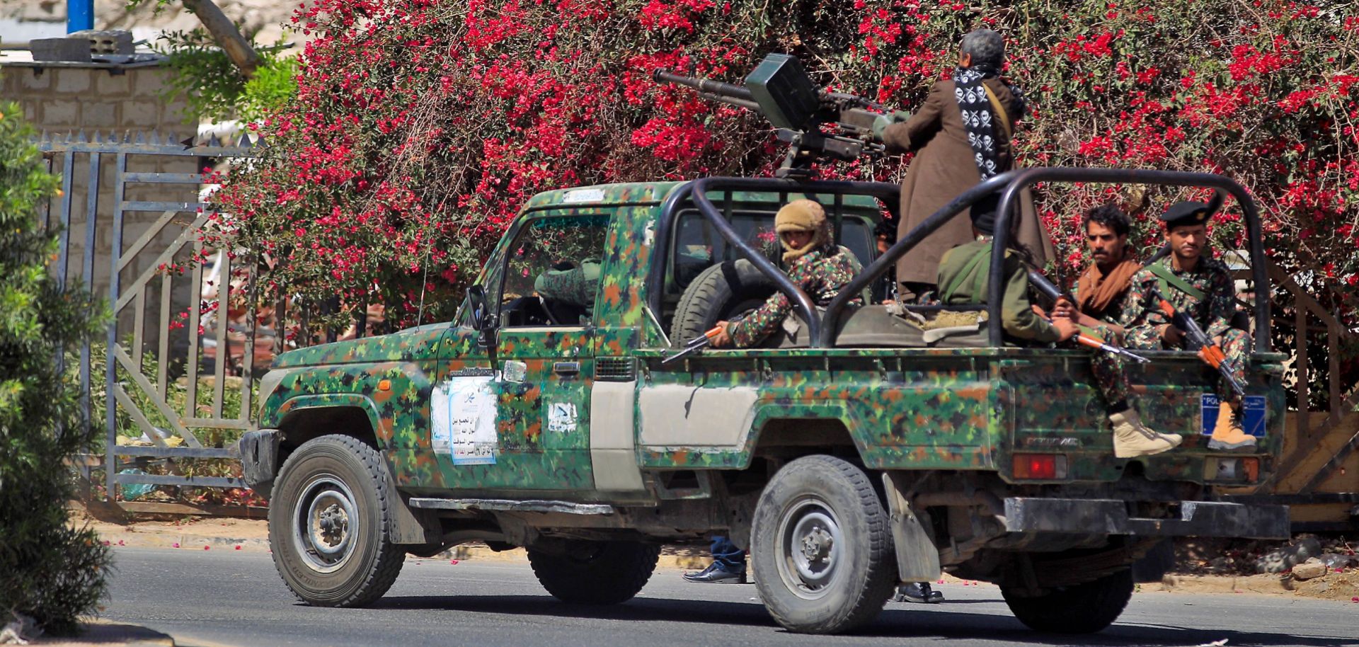 Houthi forces patrol the streets of Sanaa, Yemen, ahead of the arrival of U.N. Special Envoy Martin Griffiths at the city's airport on Jan. 31, 2019. 