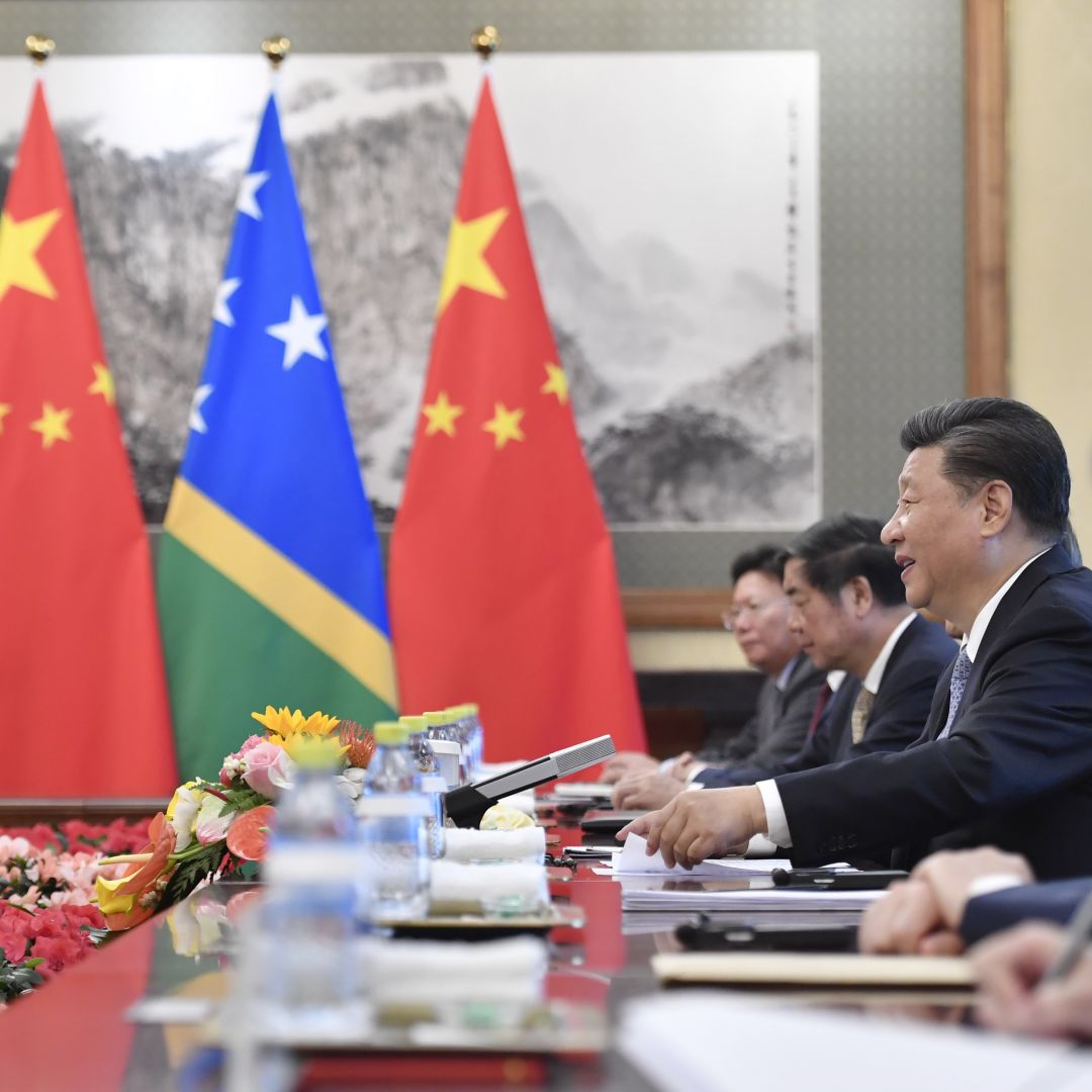 Chinese President Xi Jinping talks with Solomon Islands Prime Minister Manasseh Sogavare (not pictured) during a meeting in Beijing on Oct. 9, 2019. 