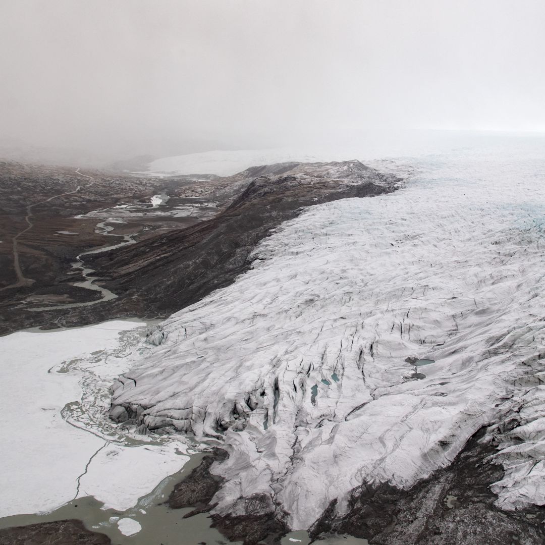 A photo taken during a helicopter tour with U.S. Secretary of State Antony Blinken shows ice receding from a glacier near Kangerlussuaq, Greenland, on May 20, 2021. A photo taken during a helicopter tour with U.S. Secretary of State Antony Blinken shows ice receding from a glacier near Kangerlussuaq, Greenland, on May 20, 2021.