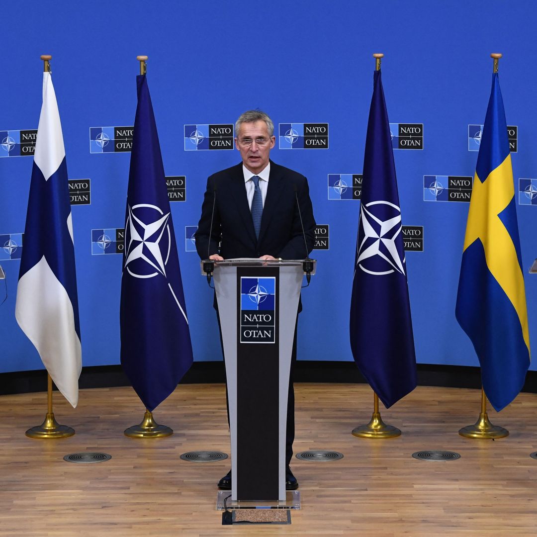 NATO Secretary-General Jens Stoltenberg (center), Finnish Foreign Minister Pekka Haavisto (left) and Swedish Foreign Minister Ann Linde (right) give a press conference after their meeting at the NATO headquarters in Brussels, Belgium, on Jan. 24, 2022. 