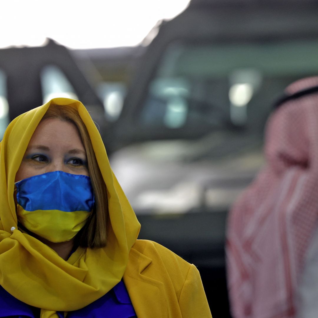 A worker at one of the stands at Saudi Arabia's first World Defense Show in Riyadh is seen wearing clothes in support of Ukraine on March 8, 2022. A worker at one of the stands at Saudi Arabia's first World Defense Show in Riyadh is seen wearing clothes in support of Ukraine on March 8, 2022.