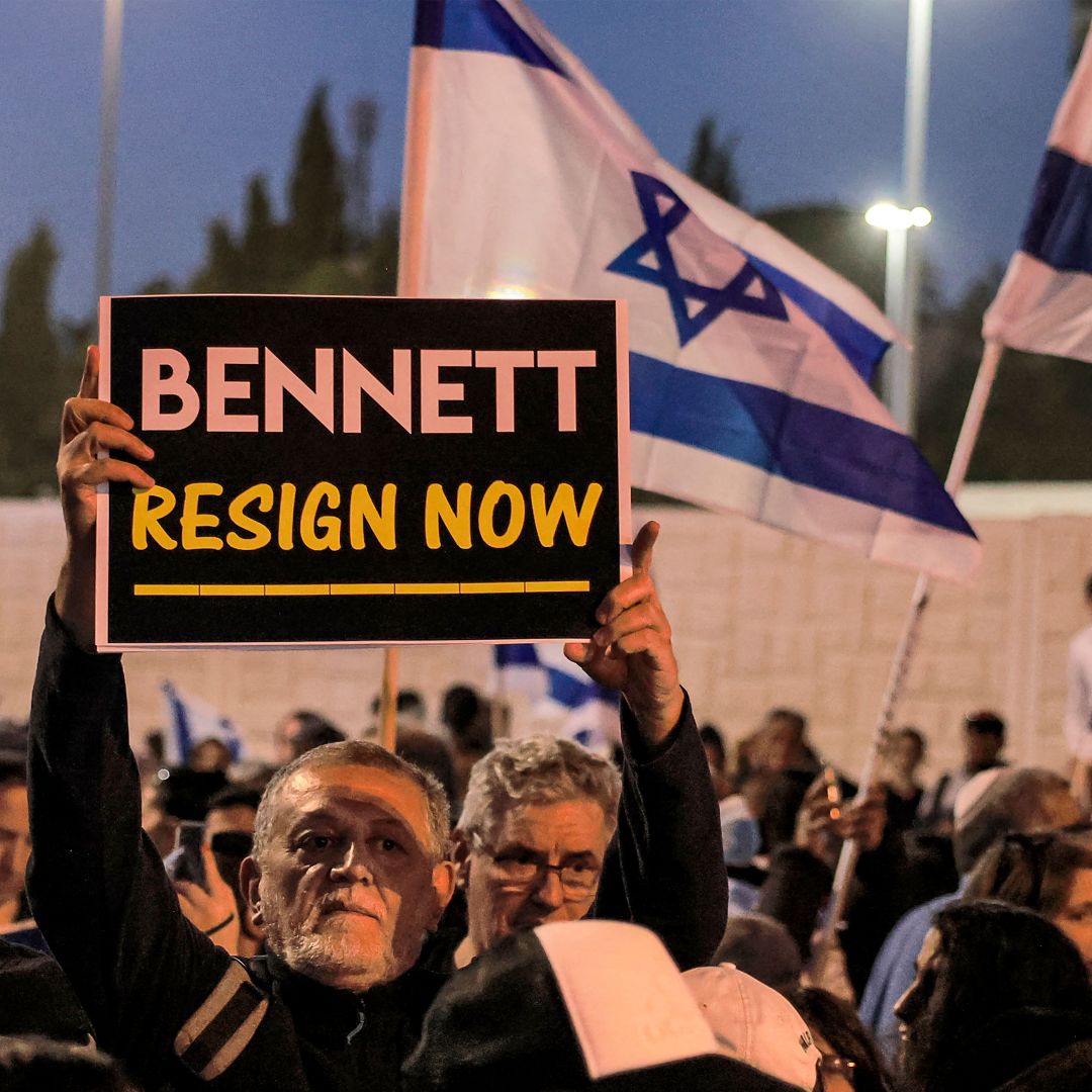 A man holds up a sign during an anti-government protest staged by Israeli right-wing supporters in Jerusalem, Israel, on April 6, 2022. A man holds up a sign during an anti-government protest staged by Israeli right-wing supporters in Jerusalem, Israel, on April 6, 2022.