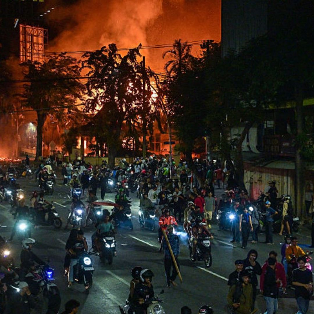 A protest in front of police headquarters Aug. 31 in in Surabaya, Indonesia.