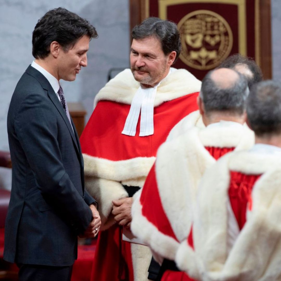 Canadian Prime Minister Justin Trudeau (L) and other officials wait for a Throne Speech on Dec. 5, 2019, at the Senate in the Canadian capital of Ottawa.