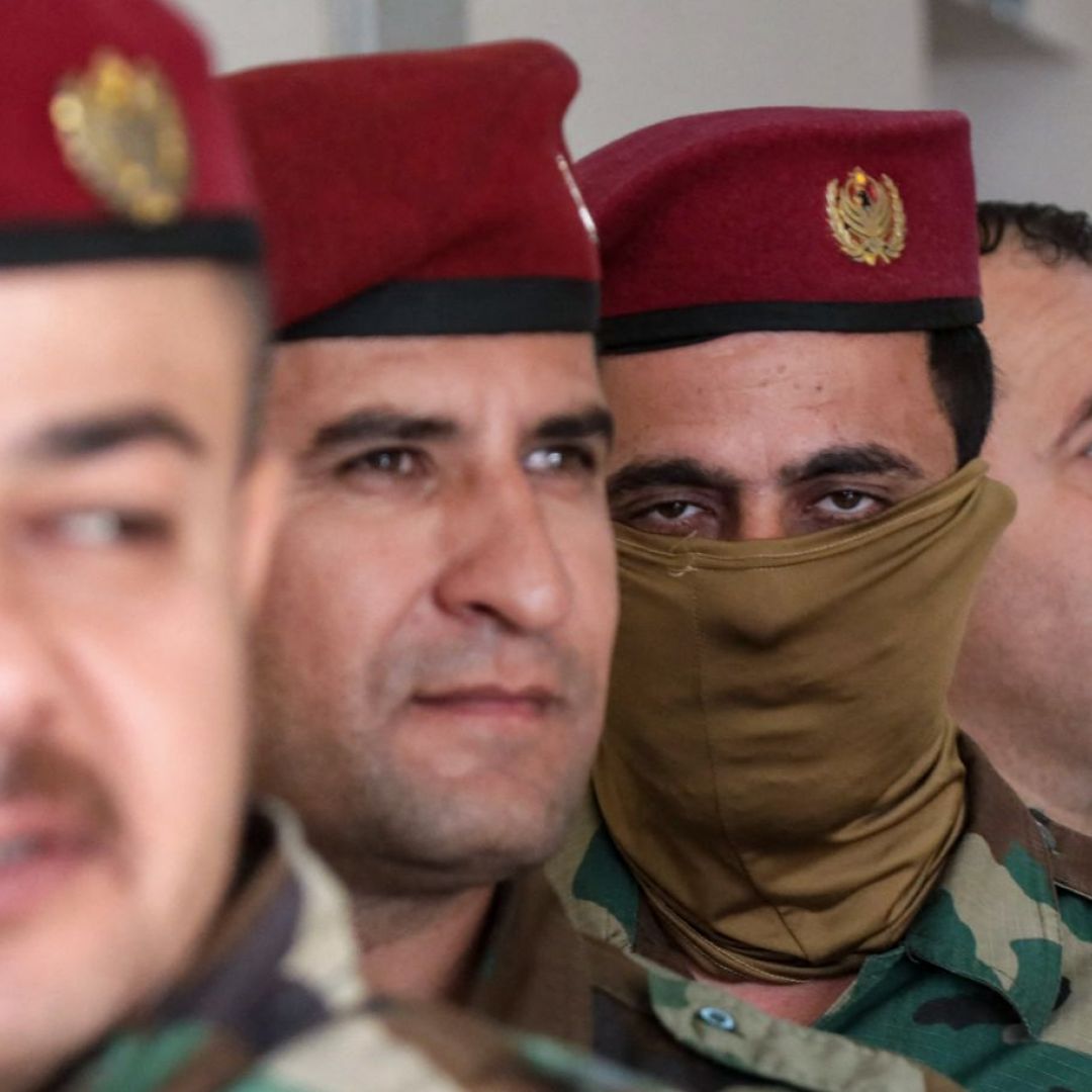 Members of the Kurdish peshmerga security forces queue at a polling station to vote ahead of the Oct. 20 parliamentary election in Arbil, the capital of Iraq's autonomous Kurdish region, on Oct. 18, 2024. Members of the Kurdish peshmerga security forces queue at a polling station to vote ahead of the Oct. 20 parliamentary election in Arbil, the capital of Iraq's autonomous Kurdish region, on Oct. 18, 2024.