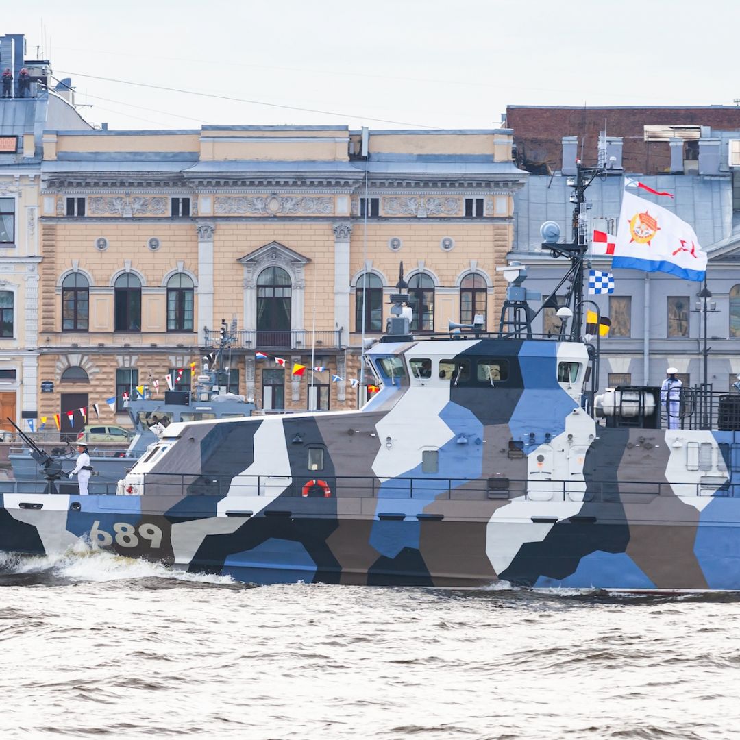 A Russian warship transits the Neva River in Saint Petersburg, Russia.