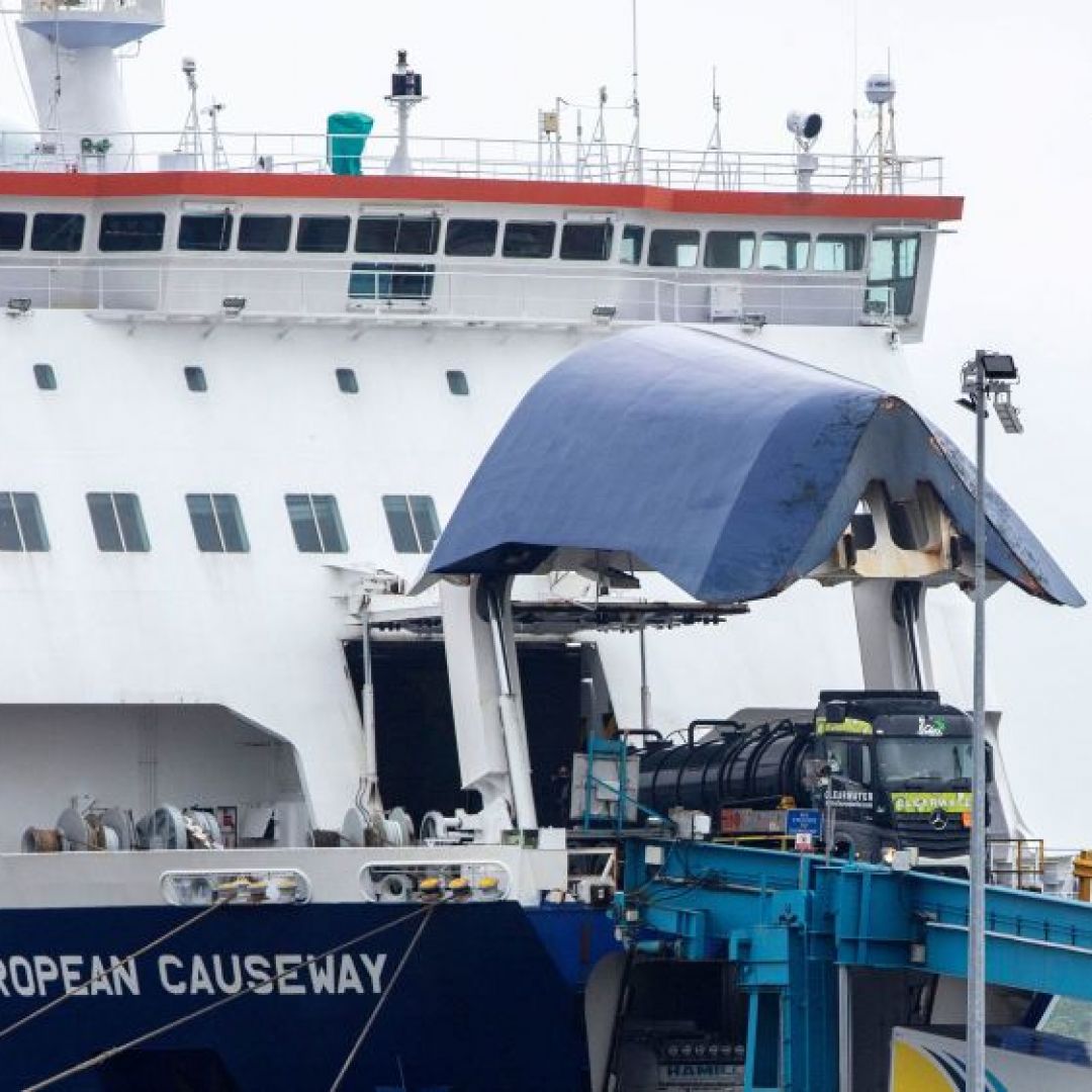 Trucks on May 17, 2022, disembark a ferry at Larne port, north of Belfast, Northern Ireland.