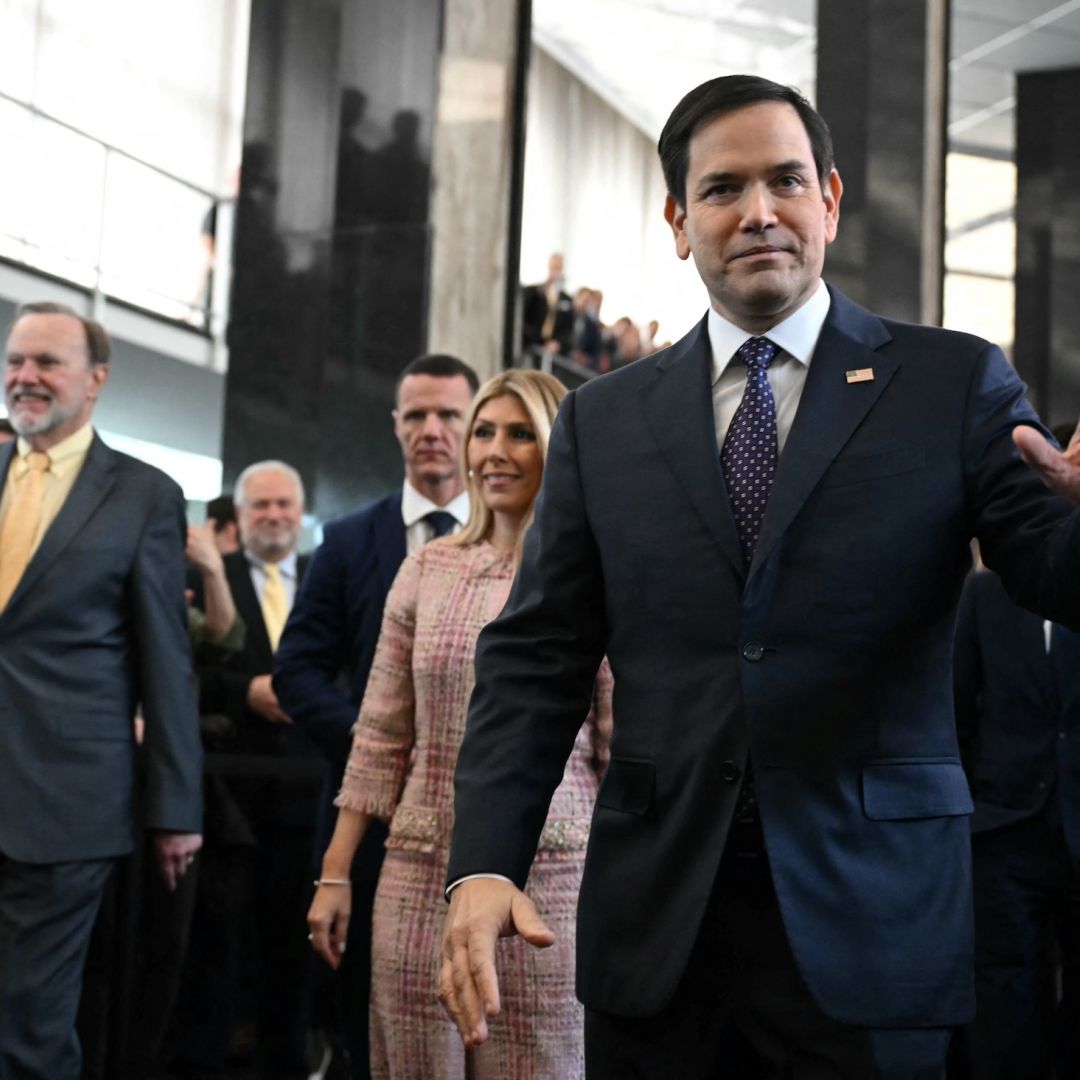 U.S. Secretary of State Marco Rubio and his wife Jeanette Rubio arrive at the State Department in Washington, D.C., to speak to employees on Jan. 21, 2025. 