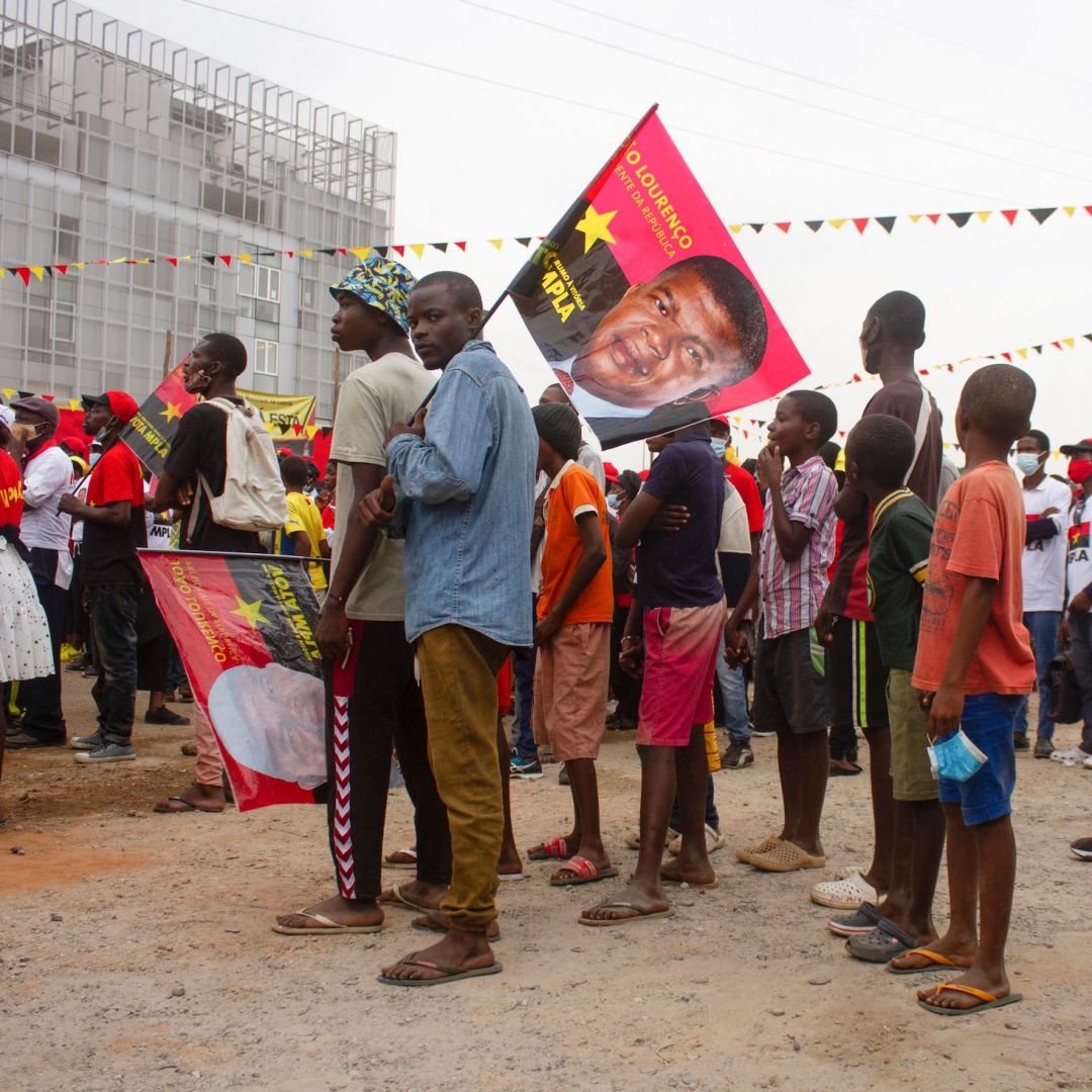 Angolan President Joao Lourenco is pictured on a flag at a campaign rally for the country’s ruling People's Movement for the Liberation of Angola (MPLA) party on June 26, 2021, at Largo das Escolas in Luanda. Angolan President Joao Lourenco is pictured on a flag at a campaign rally for the country’s ruling People's Movement for the Liberation of Angola (MPLA) party on June 26, 2021, at Largo das Escolas in Luanda.