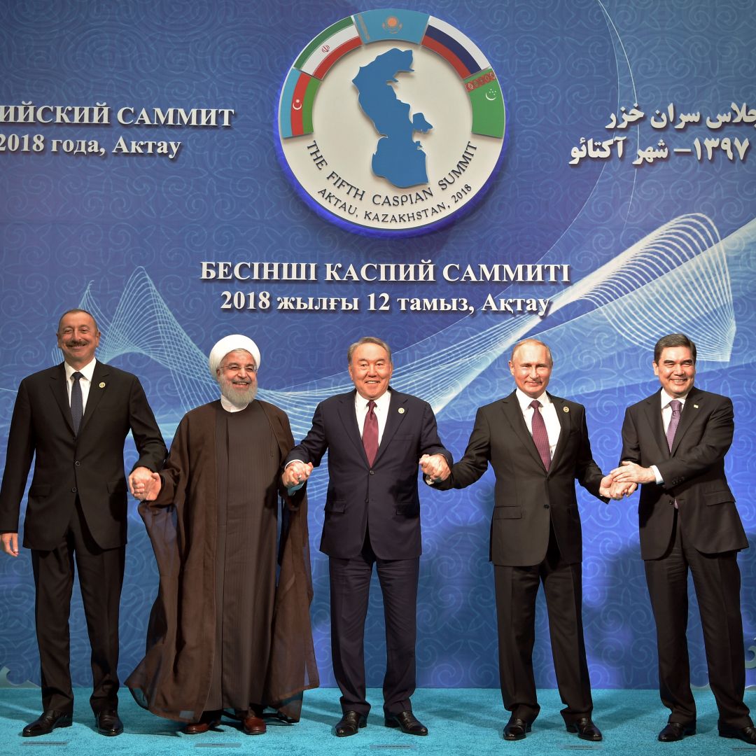 (L-R) Azerbaijan's President Ilham Aliyev, Iranian President Hassan Rouhani, Kazakhstan's President Nursultan Nazarbayev, Russian President Vladimir Putin and Turkmenistan's President Gurbanguly Berdymukhamedov pose after the signing ceremony at the 5th Caspian Summit in Aktau on August 12.