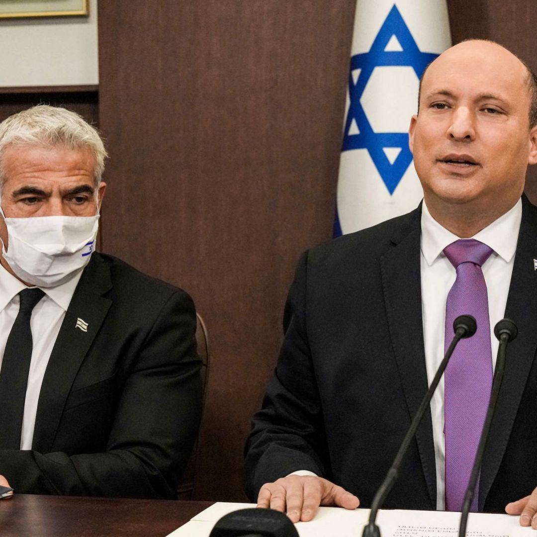 Israeli Prime Minister Naftali Bennett (R) and Foreign Minister Yair Lapid on Feb. 20, 2022, in Jerusalem. Israel's attempts to remain neutral during the Ukraine war may not survive Russian escalation in Ukraine or a new Israeli prime minister in 2023. Israeli Prime Minister Naftali Bennett (R) and Foreign Minister Yair Lapid on Feb. 20, 2022, in Jerusalem.