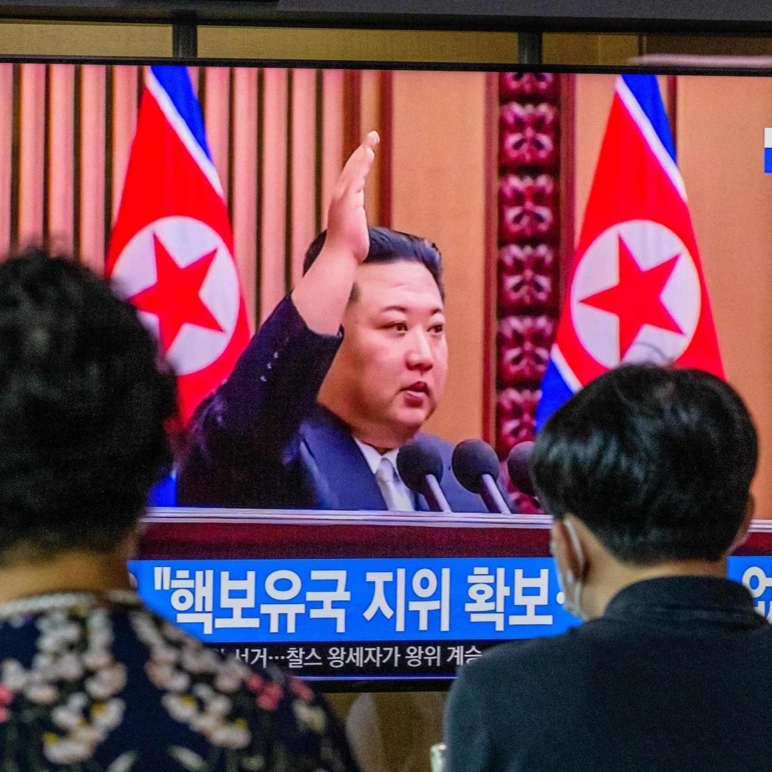 File footage of North Korean leader Kim Jong Un is seen on a television screen at a train station in Seoul, South Korea, on Sept. 9, 2022. 