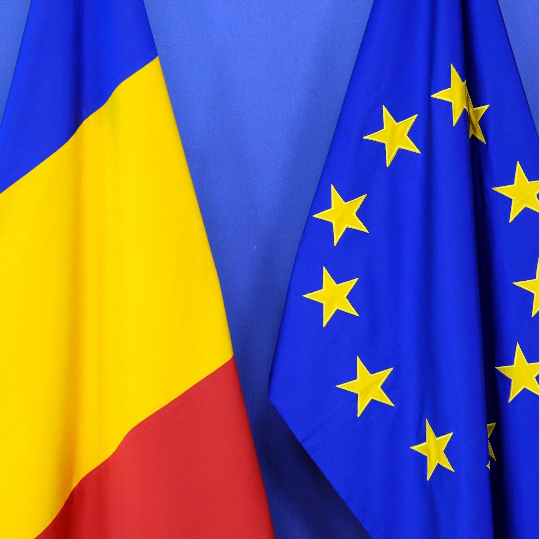 The Romanian and EU flags are seen at the European Commission's headquarters in Brussels, Belgium in February 2017.