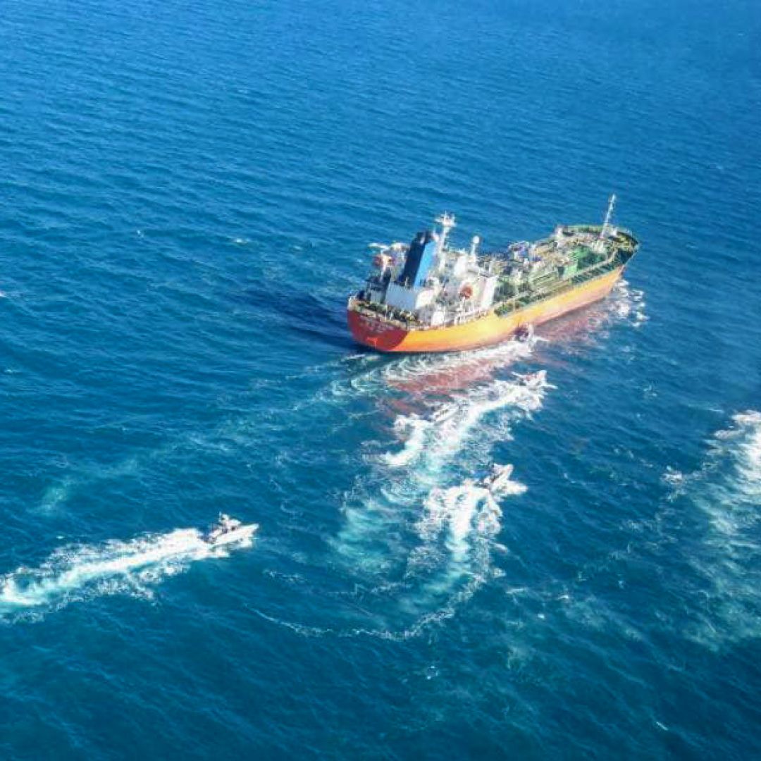 A South Korean-flagged tanker is escorted in the Persian Gulf after being seized by the Iranian navy on Jan. 4, 2021. A South Korean-flagged tanker is escorted in the Persian Gulf after being seized by the Iranian navy on Jan. 4, 2021.